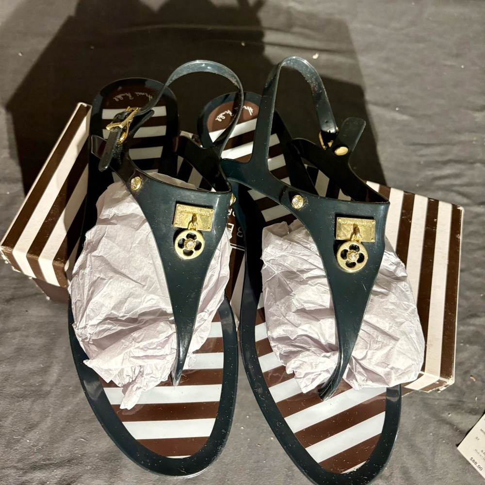 HENRI BENDEL Black and Gold jelly Sandals with signature brown & white stripe
